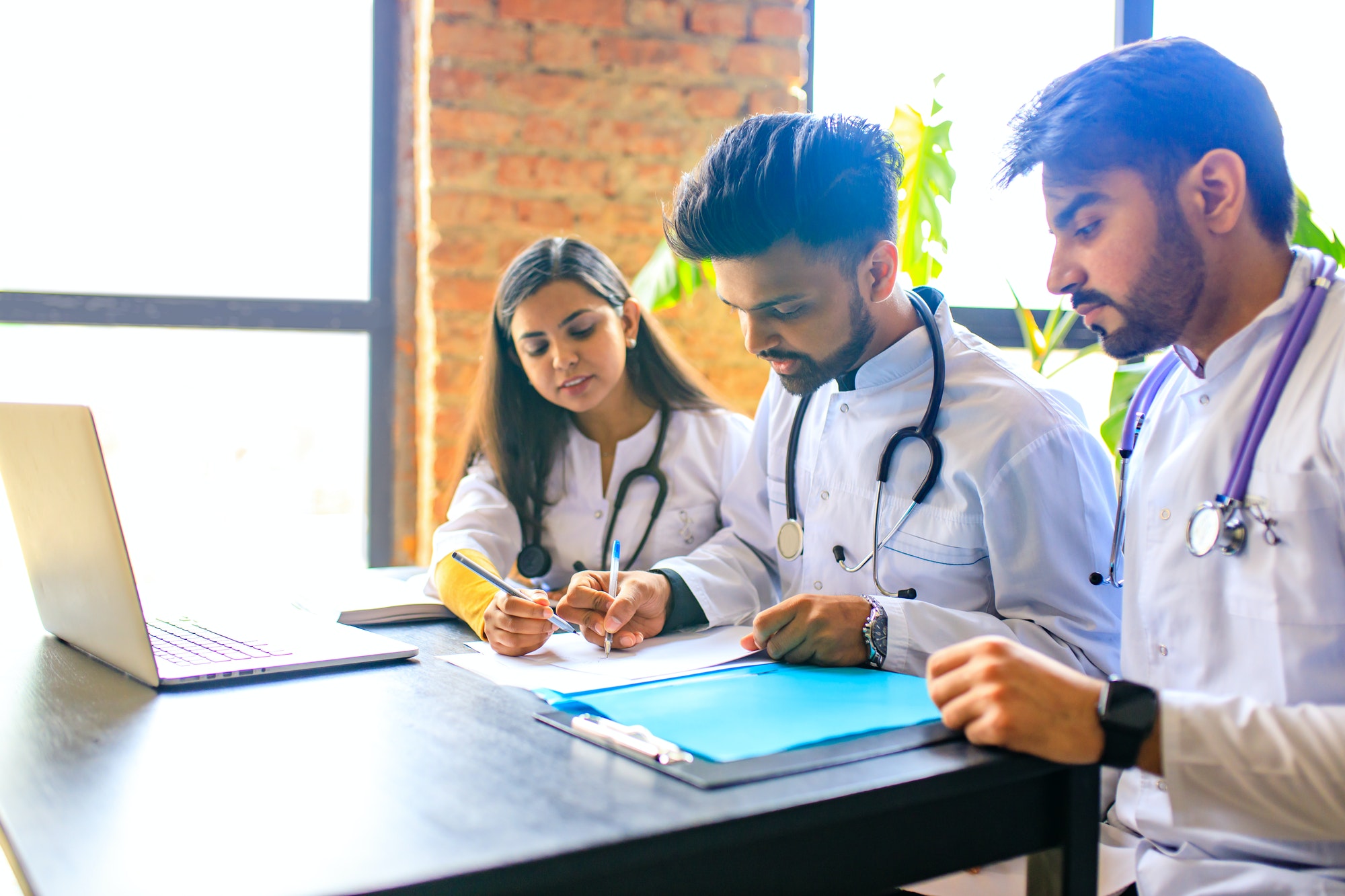 indian medic students practicing in sun classroom